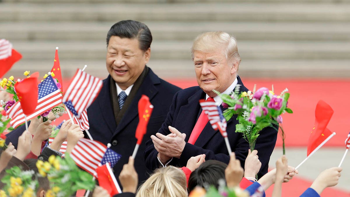 Trump com Xi em Pequim