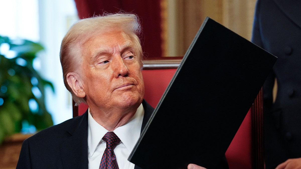 President Donald Trump takes part in a signing ceremony after his inauguration in the President's Room at the U.S. Capitol in Washington, D.C., on Monday.