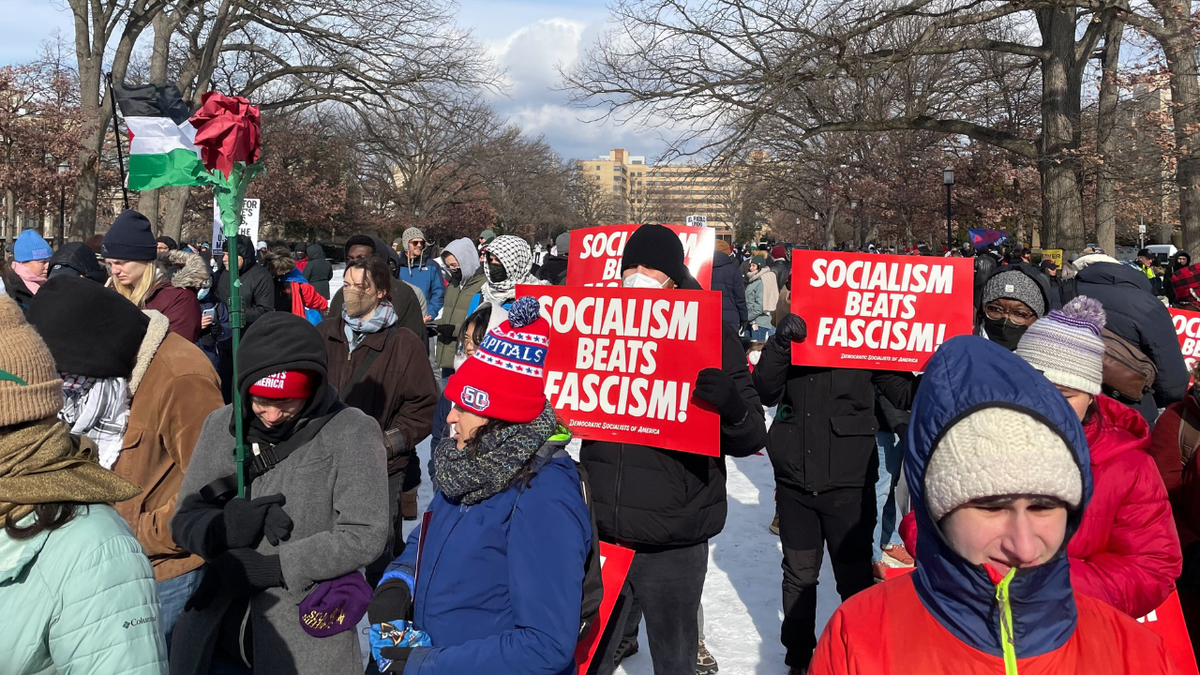 Protesters gather at the We Fight Back rally on Donald Trumps inauguration day at Meridian Hill Park in Washington DC on January 20, 2025.