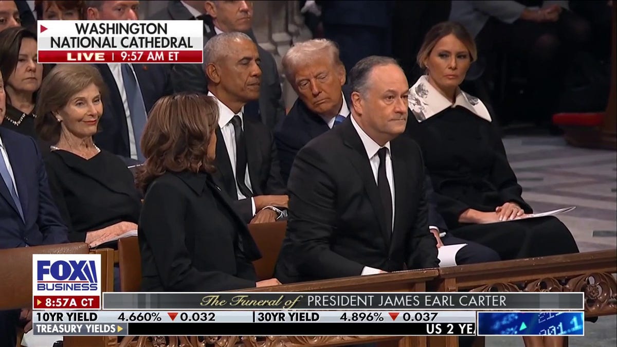 Trump and Obama sit behind Vice President Kamala Harris