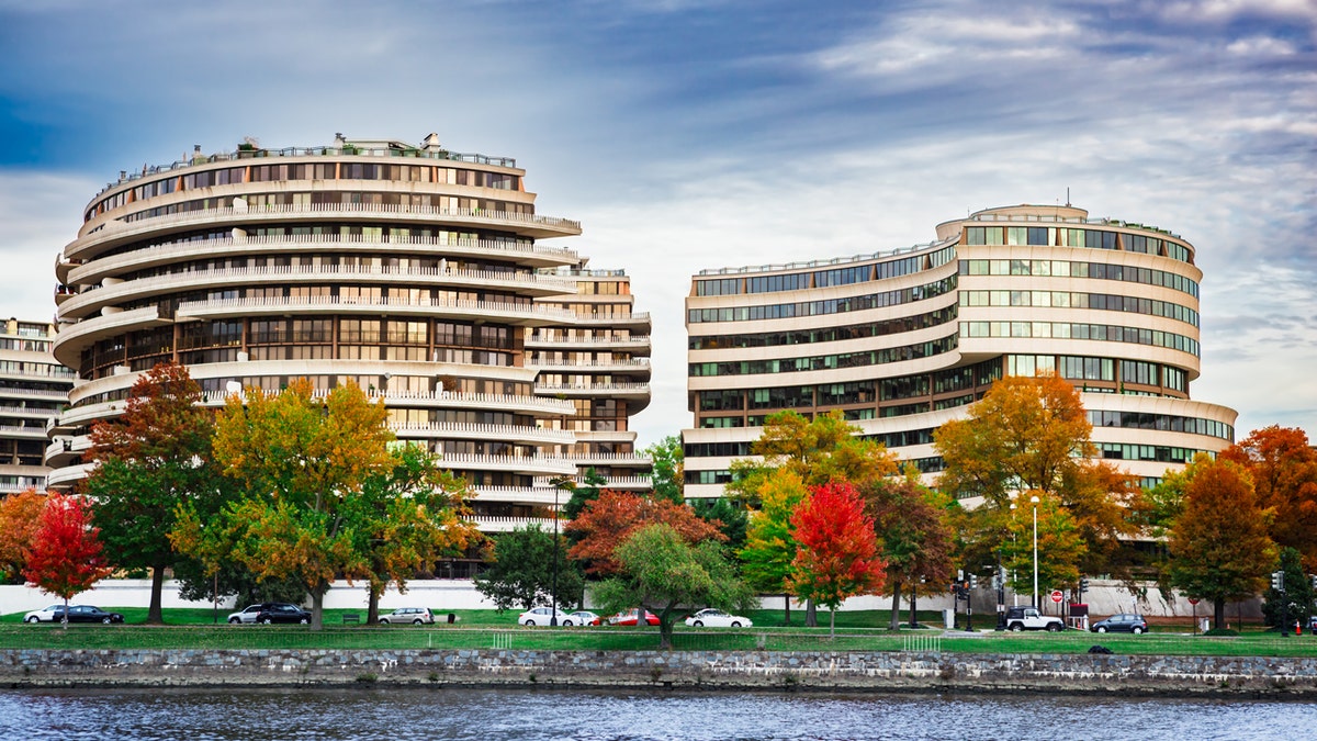 A view of the Watergate Hotel from the Potomac River in autumn.