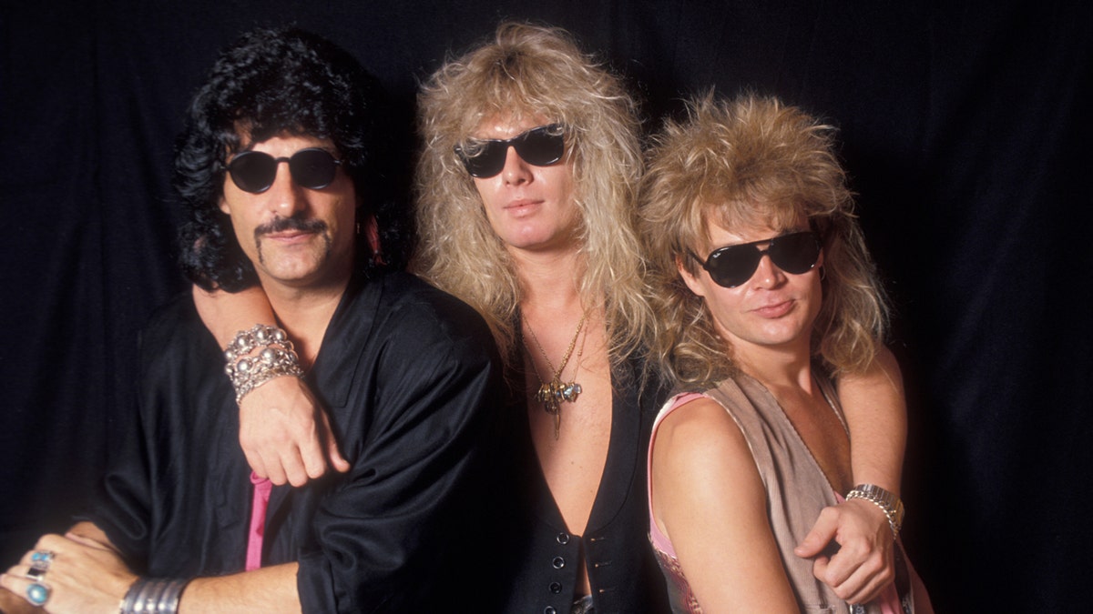 John Sykes and band members