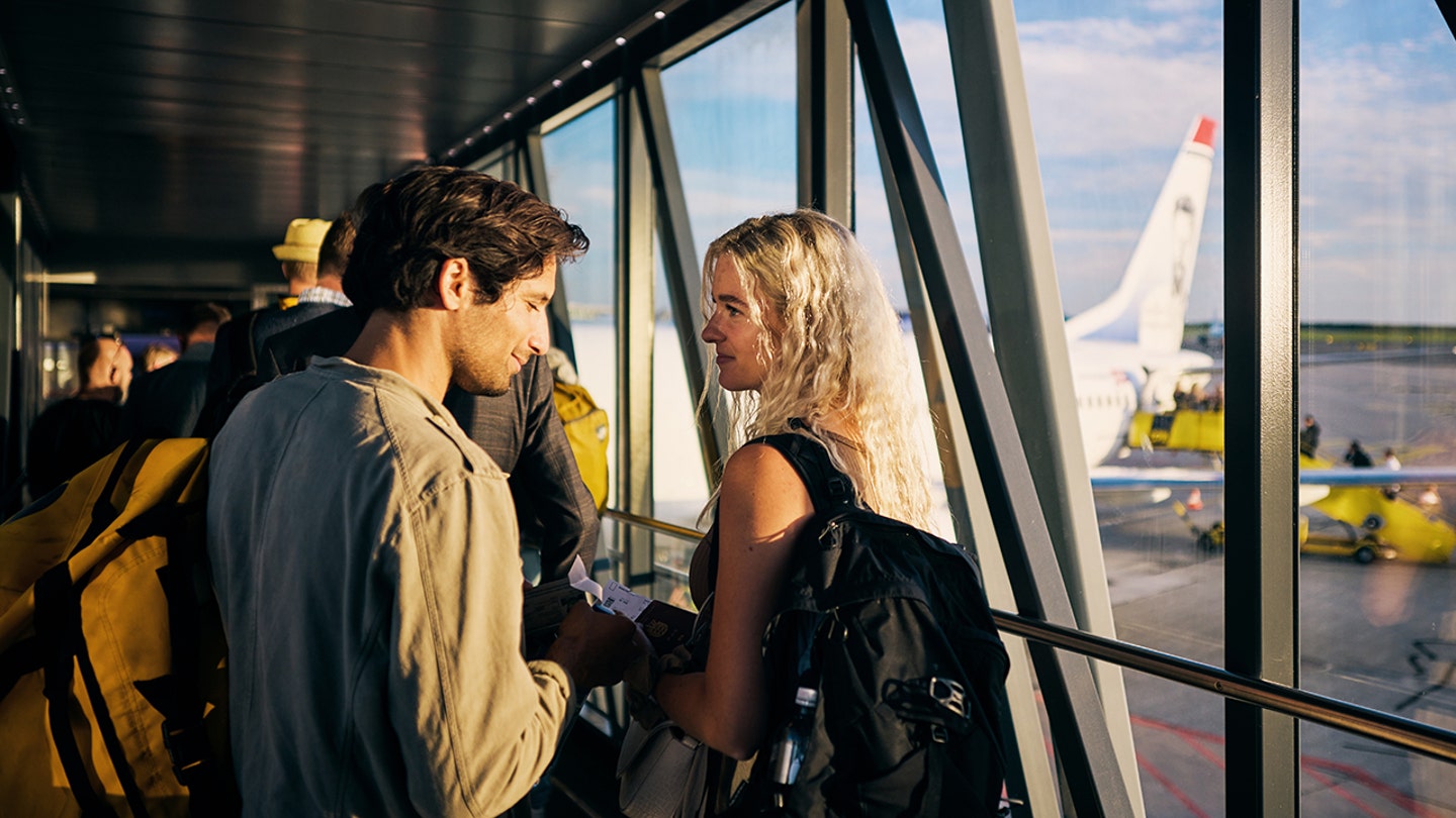 couple boarding flight