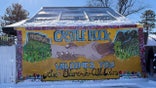 Mural depicting hands grasping and the words "Castle Rock welcomes you"