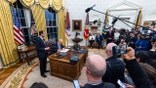 Donald Trump takes press questions in the Oval Office