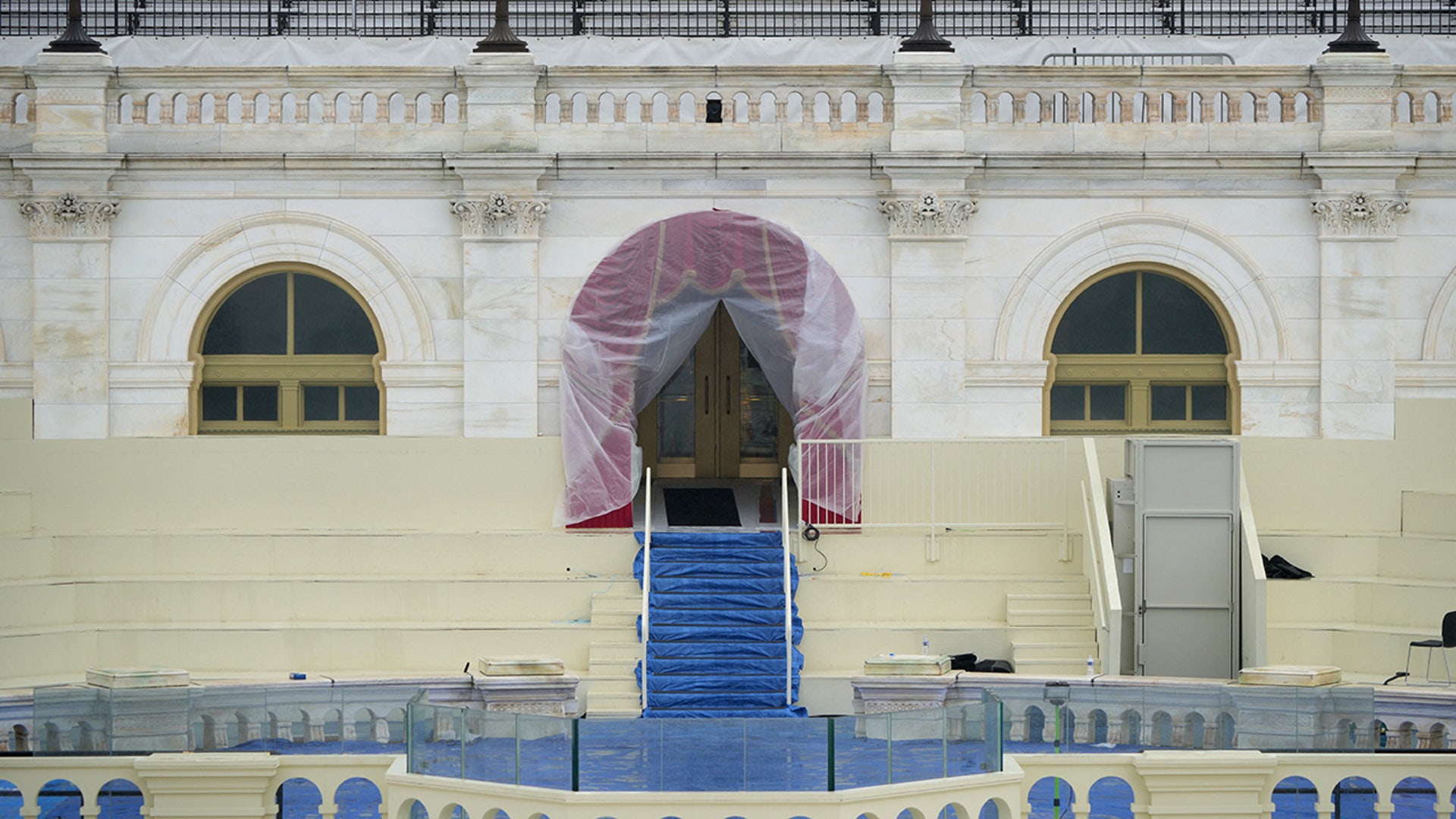 The entrance to the U.S. Capitol building is covered with a protective foil a day before U.S. President-elect Donald Trump is scheduled to be inaugurated