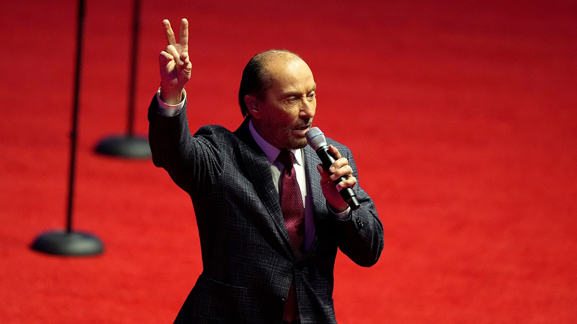 Lee Greenwood performed his hit "God Bless the USA" as President-elect Trump arrived at a rally.