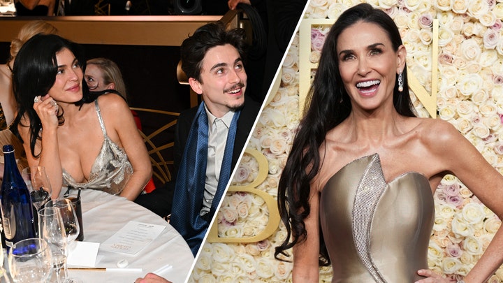 Demi Moore walks the red carpet in a gold dress at the 2025 Golden Globes