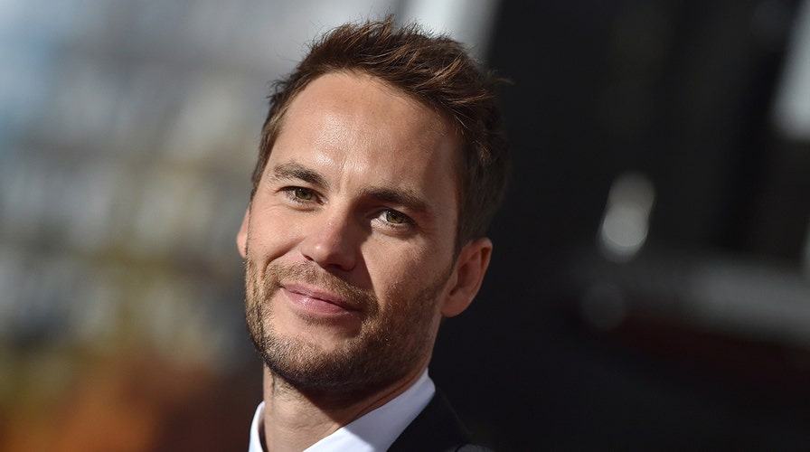 Taylor Kitsch, Marcus Luttrell pay tribute to fallen Navy SEAL at museum opening