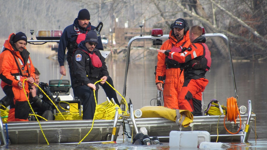 Diver Jake Crockett and different   members of the Scuba Rescue Team with Chesterfield Fire & EMS during a Dec. 2023 dive mission