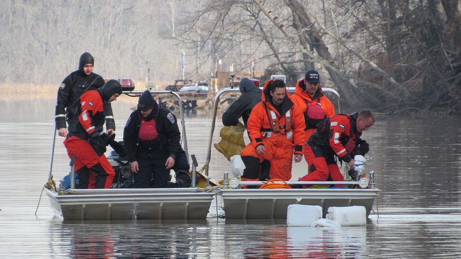 Diver Jake Crockett and different   members of the Scuba Rescue Team with Chesterfield Fire & EMS during a Dec. 2023 dive mission