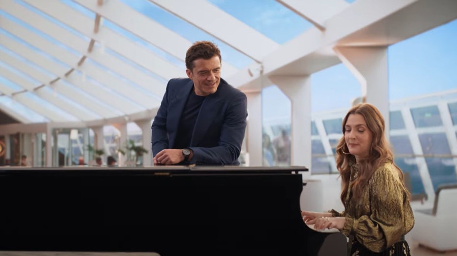 Drew Barrymore and Orlando Bloom Star next to each other in a Super Bowl ad for MSC Cruises.