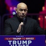 UFC Ceo Dana White in a black suit speaks behind the podium at Trump's MAGA Victory Rally