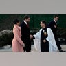 Vice President-elect JD Vance, center, and his wife, Usha Vance are greeted as they arrive for a church service to be attended by President-elect Donald Trump and his wife Melania
