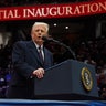 President Donald Trump speaks at an indoor Presidential Inauguration parade event at Capital One Arena