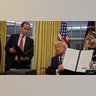 Donald Trump signs pardons for January 6 defendants in the Oval Office