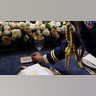 The place card for "The President" is placed on the head table