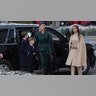 Ivanka Trump in a green jacket, skirt and hat walks with her children to attend church service ahead of the inauguration