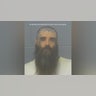 A mugshot of Matthew Woodward