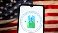 In this photo illustration, the United States Department of Housing and Urban Development (HUD) logo is seen displayed on a smartphone screen with the American flag in the background,. - Fox News