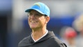 Los Angeles Chargers head coach Jim Harbaugh tosses a football on the field prior to the game against the Tampa Bay Buccaneers at SoFi Stadium. - Fox News
