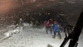 This image provided by the New Hampshire Fish and Game Department shows rescue hikers leaving on foot from the summit, on Mount Washington, N.H., Sunday, Feb. 2, 2025. (New Hampshire Fish and Game Department photo via AP) - Fox News