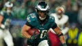 Philadelphia Eagles running back Saquon Barkley (26) rushes for a touchdown against the Washington Commanders during the second half of the NFC Championship NFL football game, Sunday, Jan. 26, 2025, in Philadelphia. - Fox News