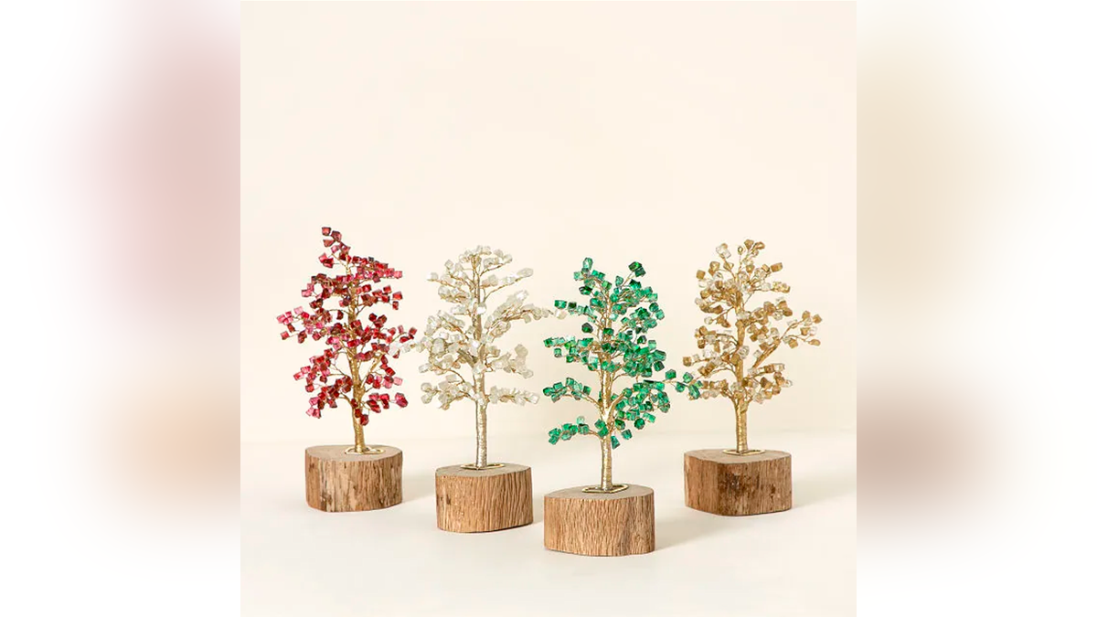 Celebrate with this beautiful handmade tree sculpture to represent your deep-rooted bond.