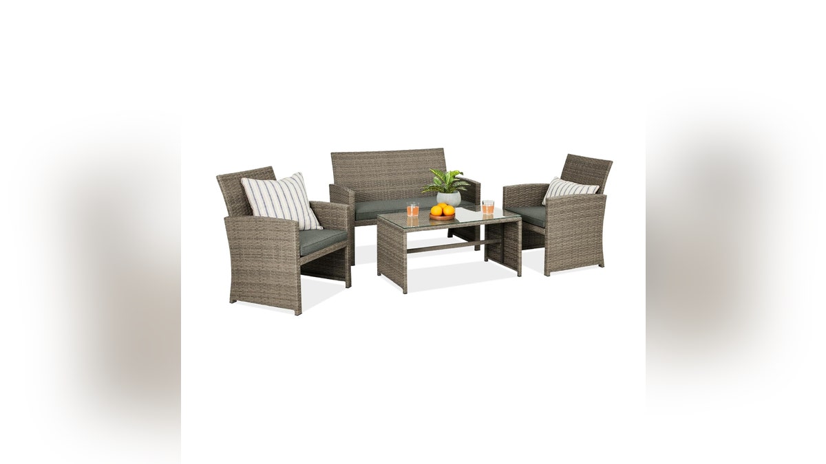 A comfortable patio set with a coffee table included.?