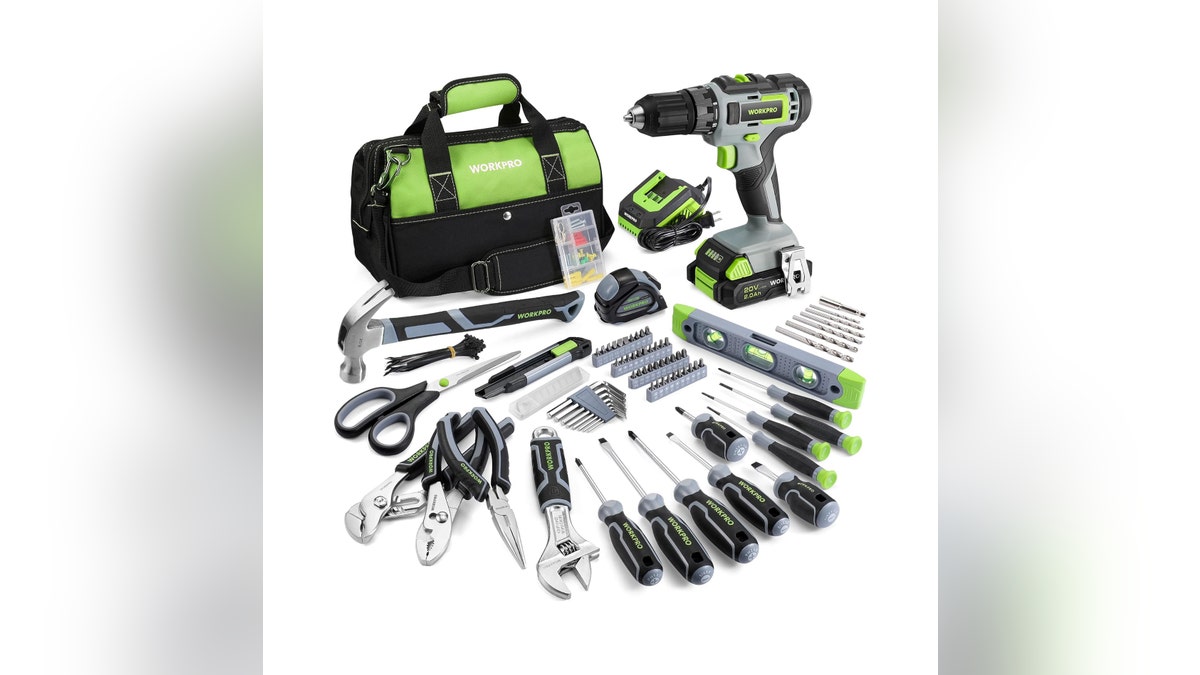 A whole DIY tool kit with hand tools and a power drill. 
