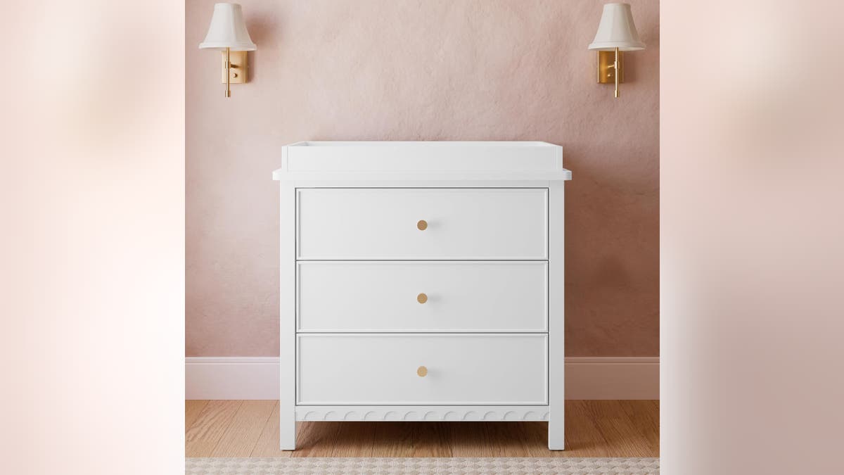 This dresser doubles as a changing table. 