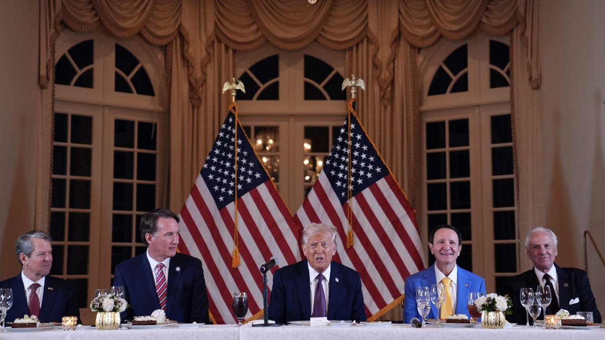 President-elect Donald Trump speaks during a meeting with Republican governors in Mar-A-Lago, Thursday, January 9, 2025, in Palm Beach, Florida, as the governor of Georgia, Brian Kemp, Virginia, Glenn Youngkin, Lousiana Gov. Jeff Landry, the governor of South Carolina, Henry McMaster and Susie Wiles, listen.