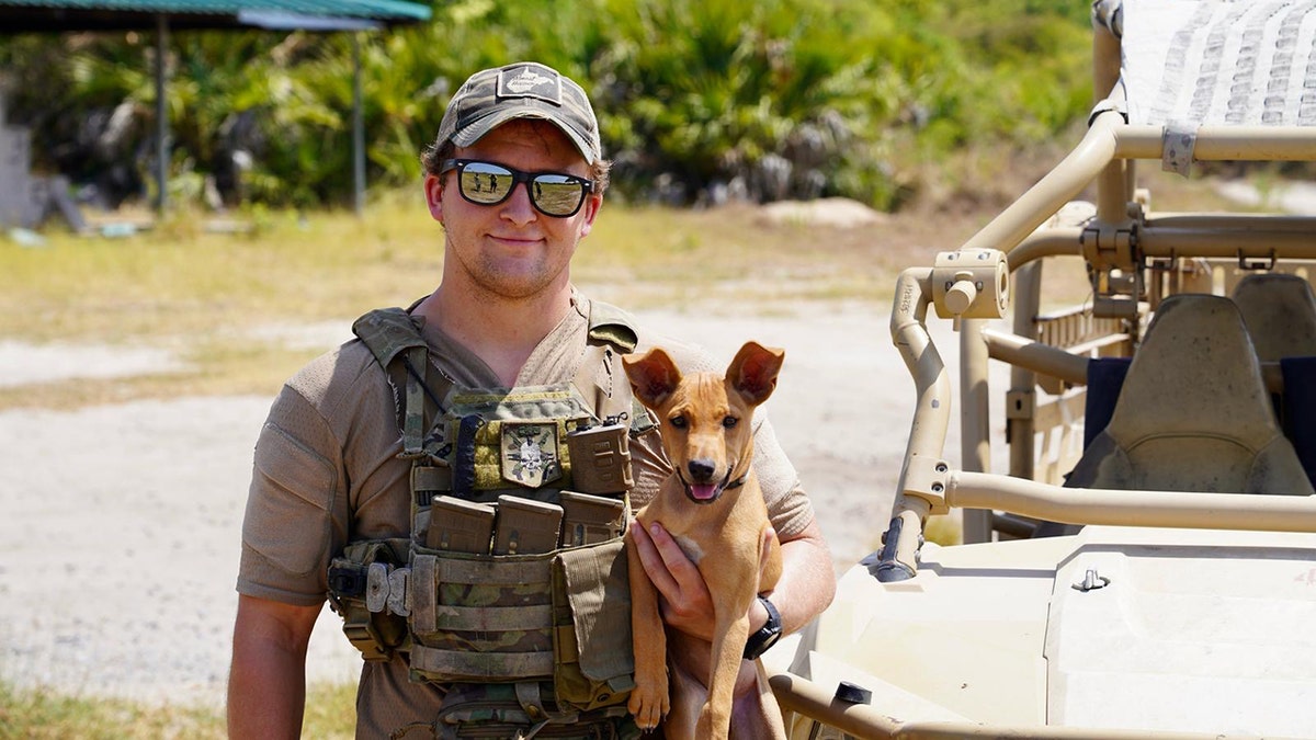 marine with puppy