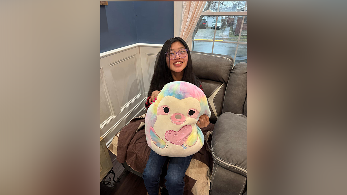 Adaline Deal holding a stuffed animal