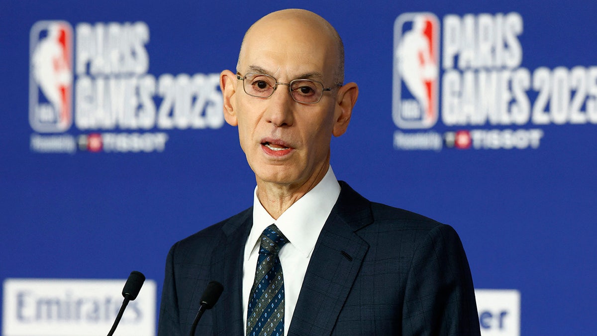 Adam Silver looks on