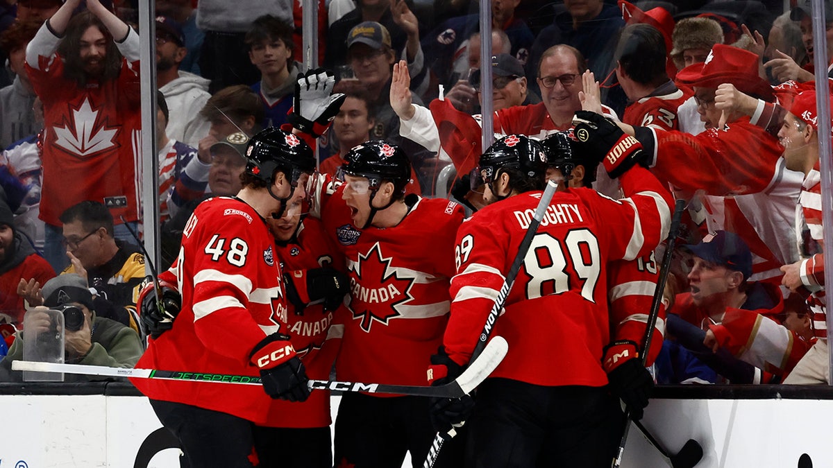 Canada's team celebrates the goal