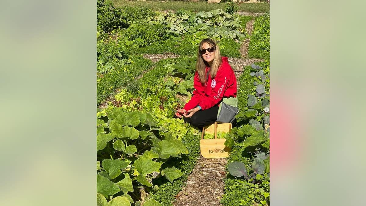 Alejandra Silva in her vegetable garden