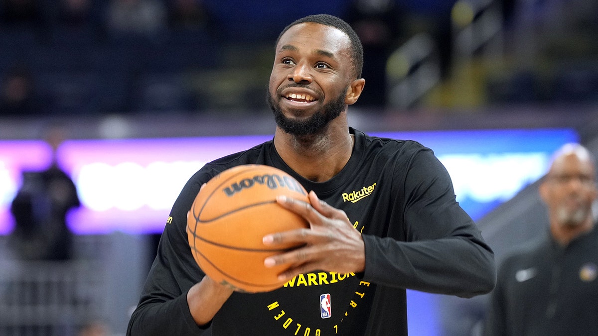 Andrew Wiggins warms up