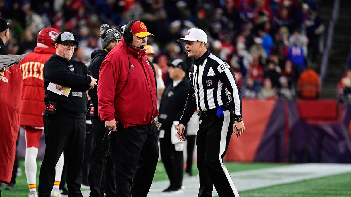 Andy Reid talks to an authoritative  