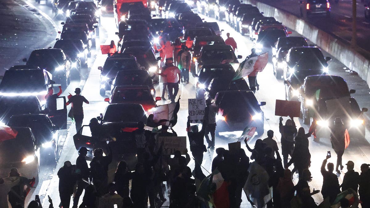 LOS ANGELES, CALIFORNIA - FEBRUARY 02: Anti-deportation demonstrators block the 101 freeway while protesting the Trump administration's deportations on February 02, 2025 in Los Angeles, California. Thousands marched and protested against Immigration and Customs Enforcement (ICE) and mass deportations in downtown Los Angeles, blocking the 101 freeway multiple times and creating gridlock in the area. (Photo by Mario Tama/Getty Images)