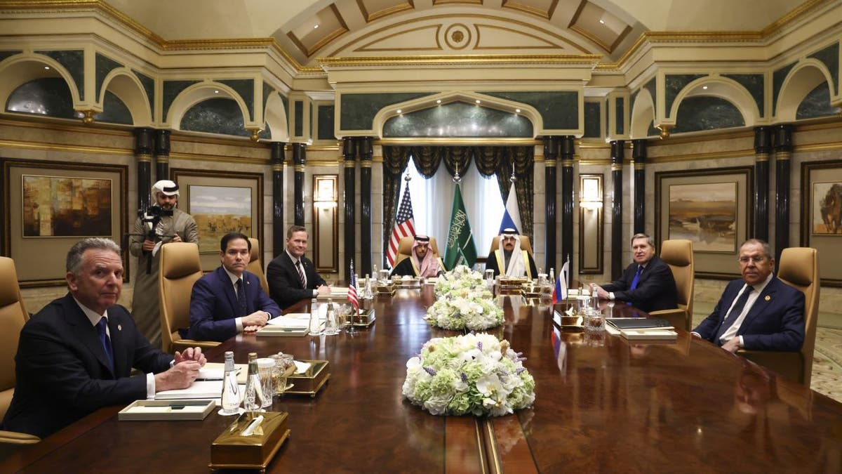 US Secretary of State Marco Rubio, Second Left, meets with Saudi Minister of Foreign Affairs Prince Faisal Bin Farhan Al Saud, Saudi National Security Advisor Mosaada Bin Mohammad Al-Aiban, US National Security Advisor Mike Waltz, Third Left, American Envoy -a, left, Russian Foreign Minister Sergei Lavrov, right And Russian President Vladimir Putin, Foreign Policy Advisor Yuri Ushakov, second to the right, at Diriyah Palace, in Riyadh, Saudi Arabia, Tuesday 18 February 2025 (Evelyn Hockstein/Pool of Photos by AP)