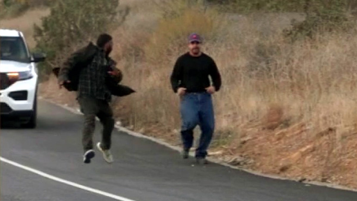 A man chases the suspect