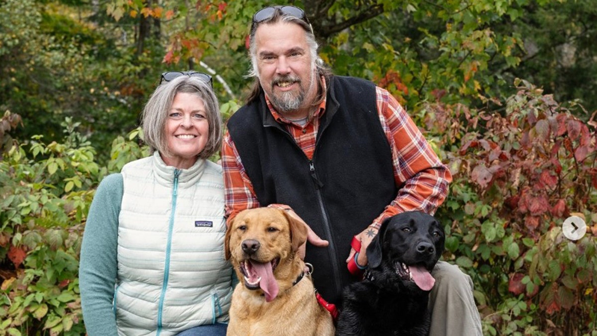 ginna dix and matt dix are pictured with their dog 