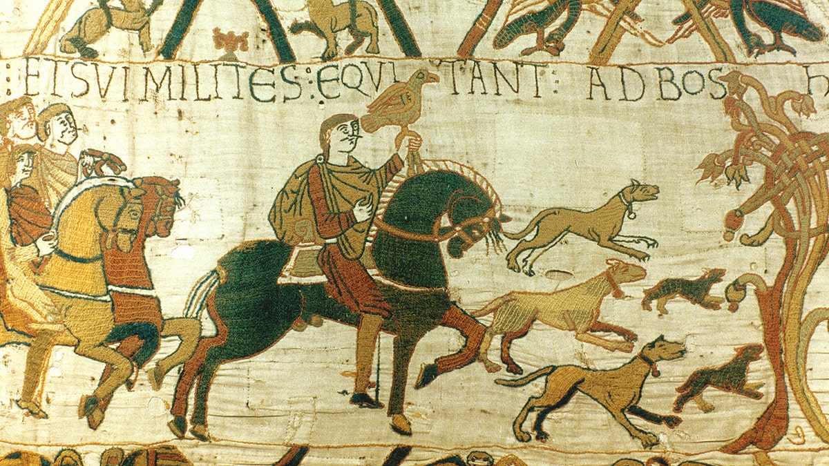 Bayeux Tapestry 1067: Harold Godwinson, Earl of Wessex (later Harold II of England), holding hawk, riding to his estate at Bosham for hunting and sea fishing. Ship blown across English Channel to Brittany, 1064. Dog Hound Horse Textile