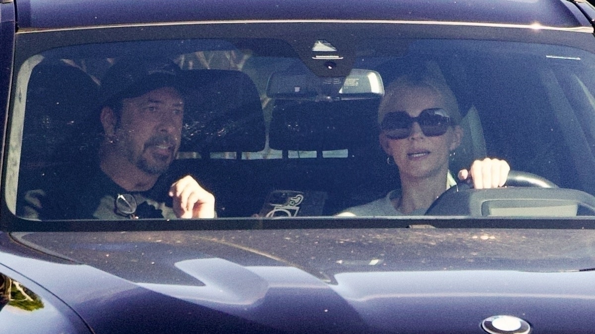 Dave Grohl and his wife, Jordyn Blum, in the car.