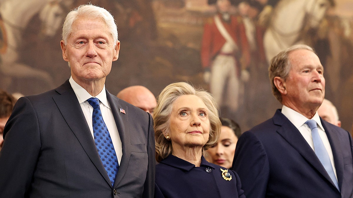 Former President Bill Clinton, former Secretary of State Hillary Clinton, and former President George W. Bush