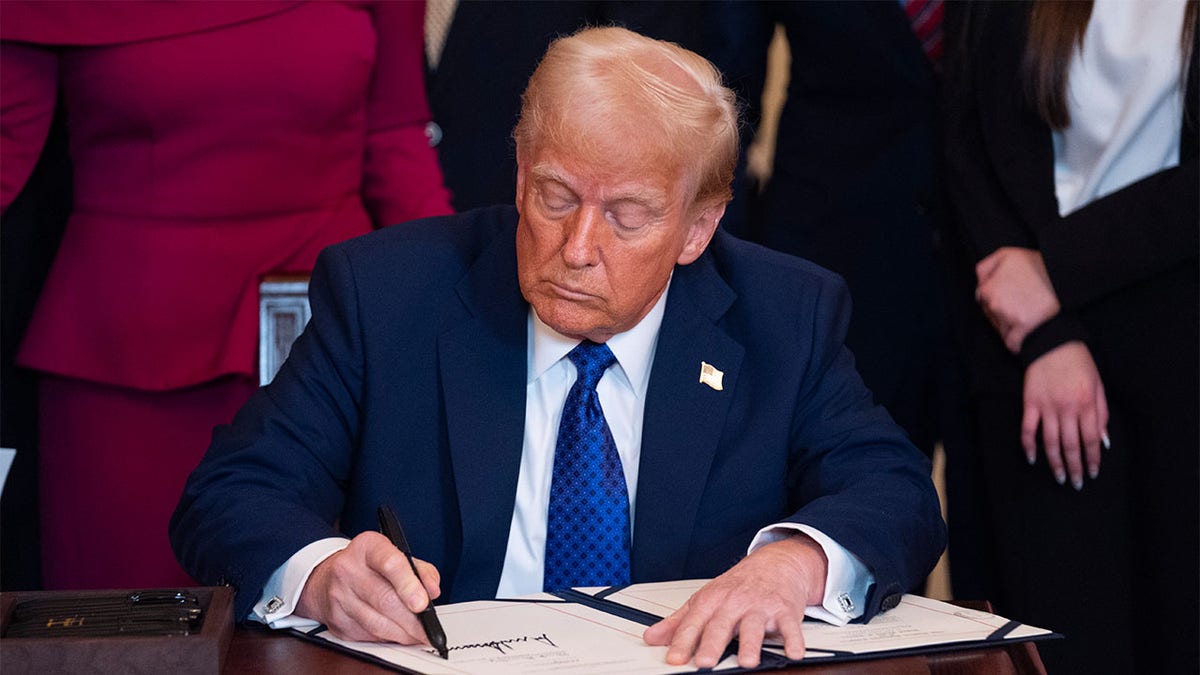 President Donald Trump signed the Lyken Lelly Act in the White House East room on Wednesday, January 29, 2025. (AP Photo/Evan Vucci)