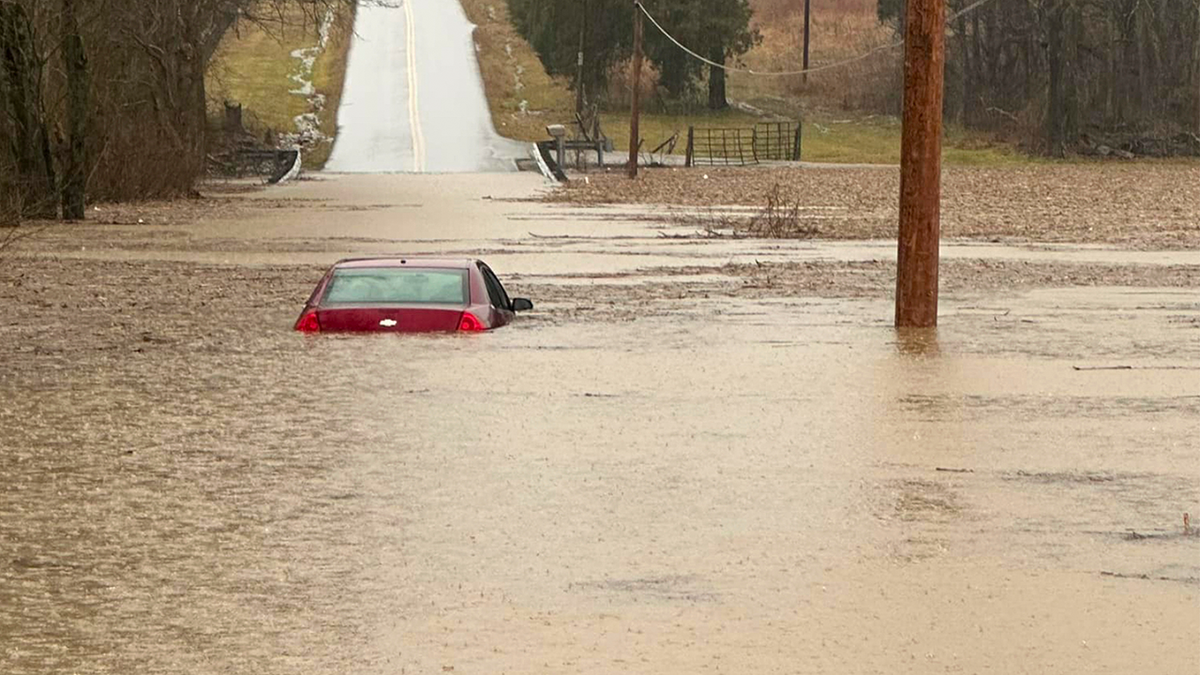 A partially submerged car