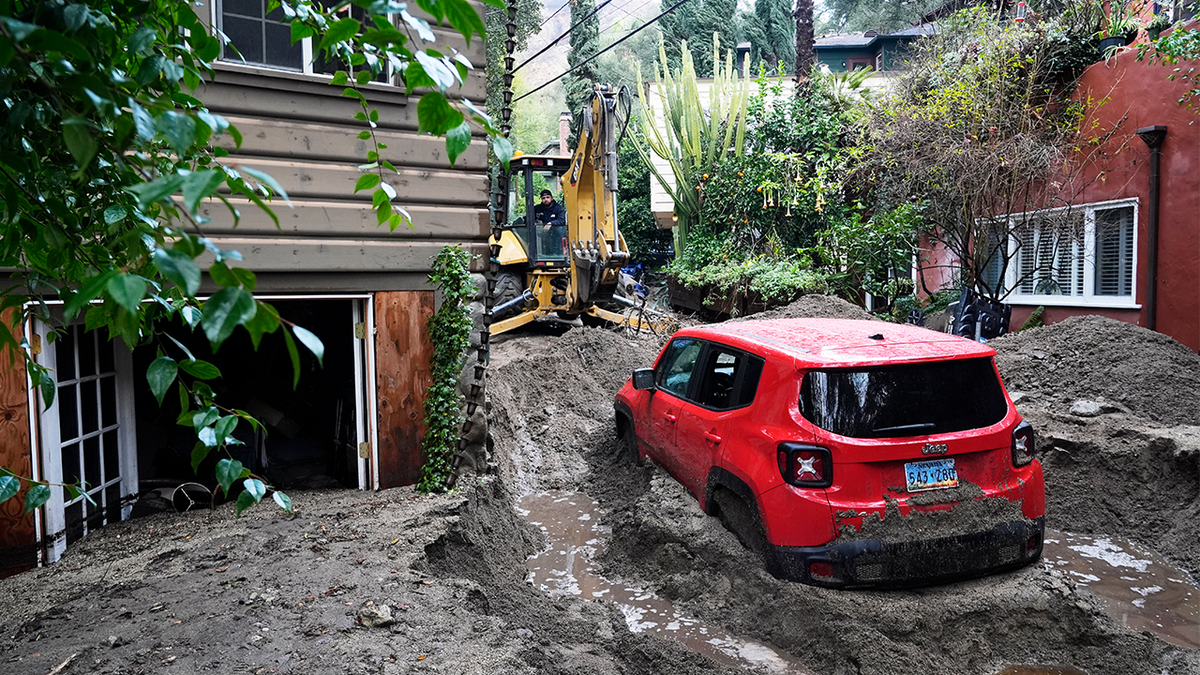 Vehicles dug out of the mud