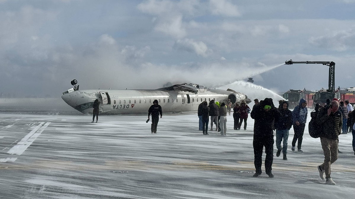 Passengers evacuate Delta Air Lines